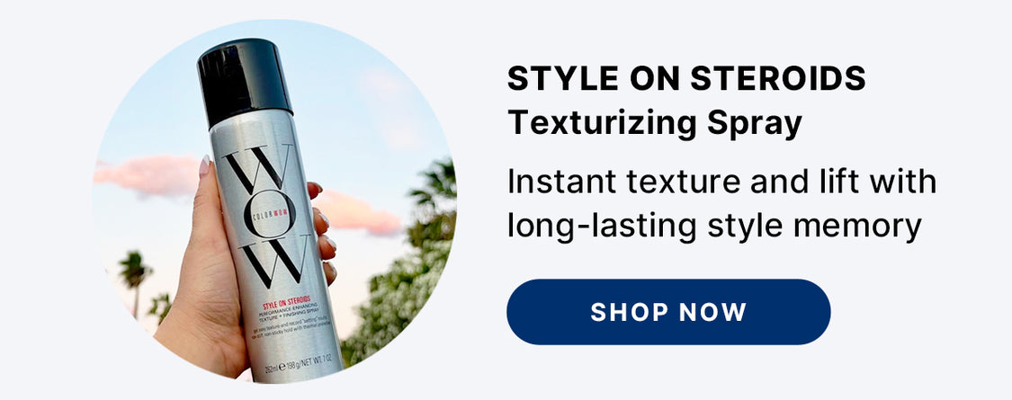 Color Wow Style on Steroids Texturizing Spray promotional image. Displays a hand holding the spray can against an outdoor sunset background. Text highlights instant texture and lift with long-lasting style memory. Includes a Shop Now button.